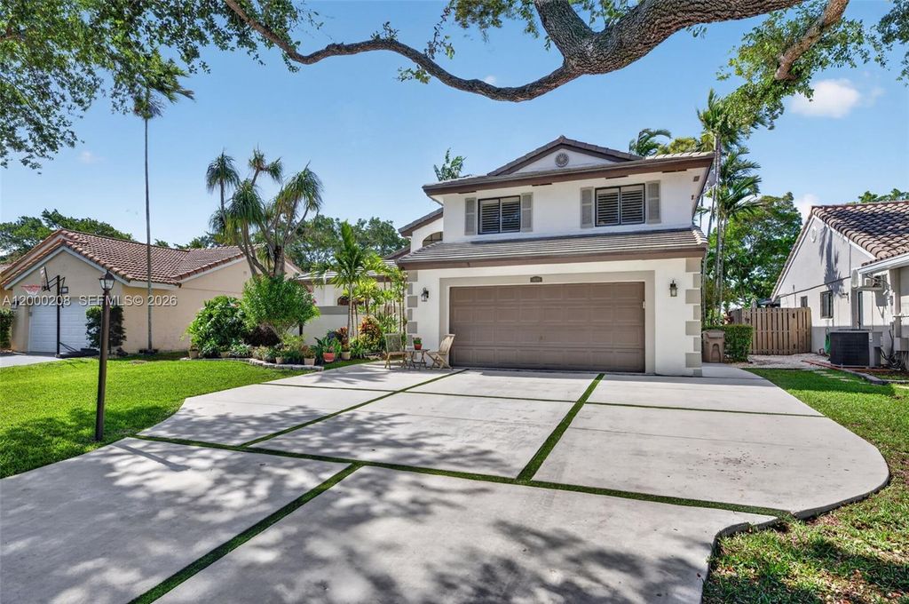 Photo of 15620 Gauntlet Hall Mnr, Davie, FL 33331 (MLS # A12000208)