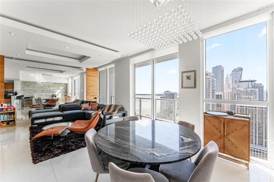 A rare, one-of-a-kind residence featuring unique, custom finishes originally designed as the developer’s showcase unit. Located on the 44th floor, this apartment offers unobstructed south-facing views of Biscayne Bay and the downtown Miami skyline, a truly distinctive and protected vantage point. Two spacious balconies and two bedrooms are perfectly positioned to capture striking water and city views.

Ideally situated in front of Bayfront Park and Bayside, the building offers 5-star amenities, including indoor and outdoor jacuzzis, steam room, sauna, massage rooms, four pools, and a state-of-the-art fitness center. With the Waldorf Astoria planned next door, the neighborhood is poised to become one of Miami’s most prestigious luxury destinations, all within walking distance to Kaseya Center, Pérez Art Museum, Frost Museum of Science, and premier dining, shopping, and entertainment.