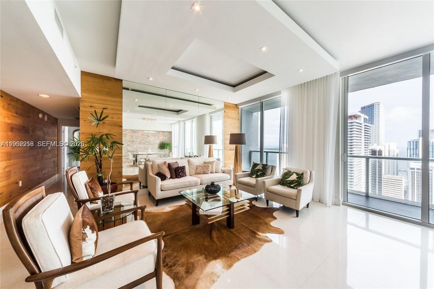 A rare, one-of-a-kind residence featuring unique, custom finishes originally designed as the developer’s showcase unit. Located on the 44th floor, this apartment offers unobstructed south-facing views of Biscayne Bay and the downtown Miami skyline, a truly distinctive and protected vantage point. Two spacious balconies and two bedrooms are perfectly positioned to capture striking water and city views.

Ideally situated in front of Bayfront Park and Bayside, the building offers 5-star amenities, including indoor and outdoor jacuzzis, steam room, sauna, massage rooms, four pools, and a state-of-the-art fitness center. With the Waldorf Astoria planned next door, the neighborhood is poised to become one of Miami’s most prestigious luxury destinations, all within walking distance to Kaseya Center, Pérez Art Museum, Frost Museum of Science, and premier dining, shopping, and entertainment.