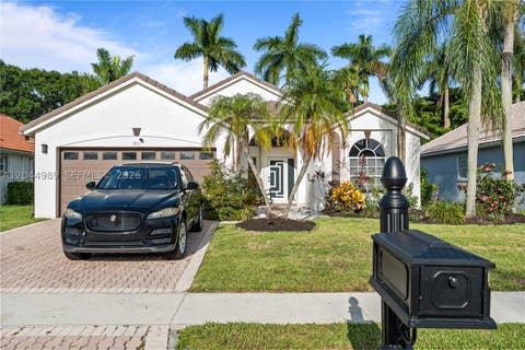 Photo of 1971 Oak Berry Cir, Wellington, FL 33414 (MLS # A12044989)