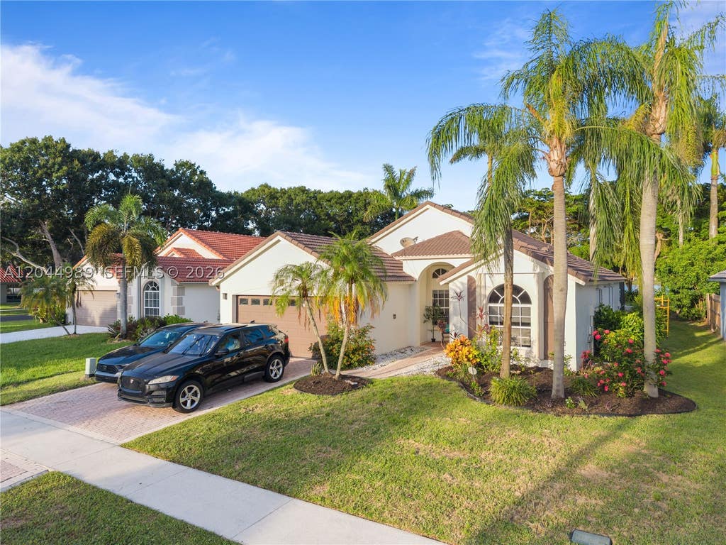 Photo of 1971 Oak Berry Cir, Wellington, FL 33414 (MLS # A12044989)