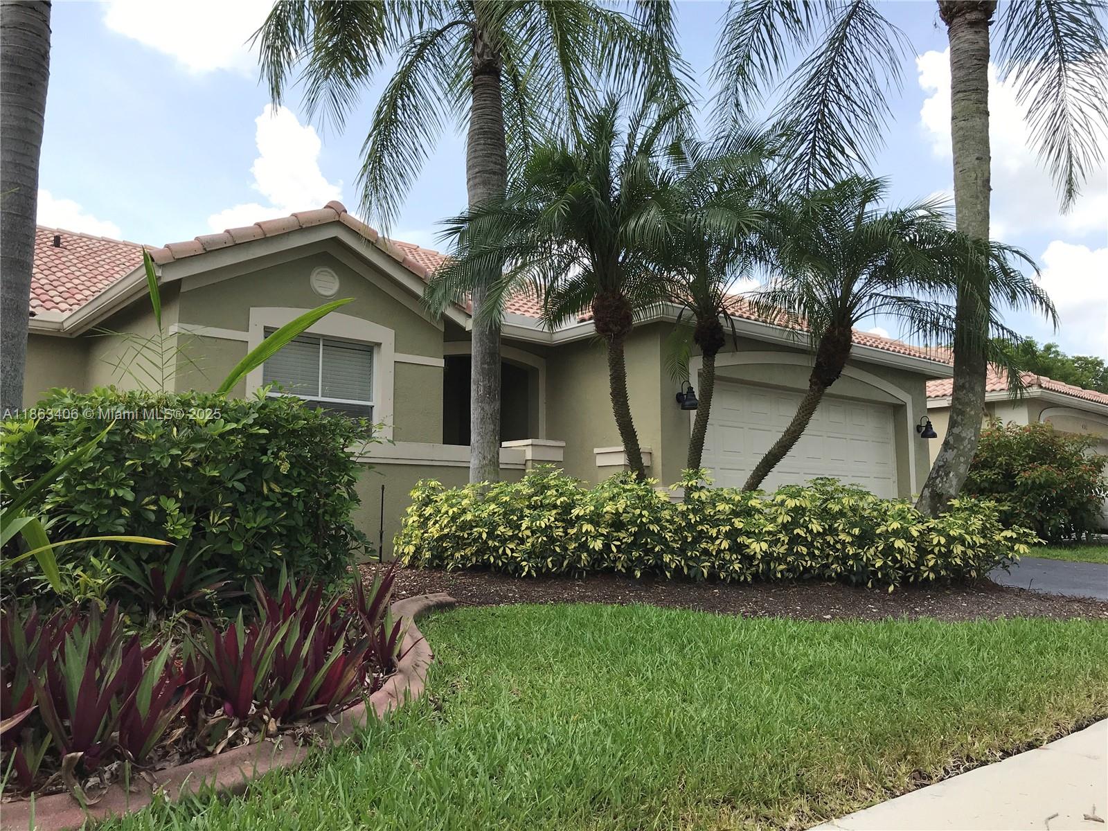 Beautiful villa in The Ridges, a gated Weston community with 24/7 security and resort-style amenities. This 3 bed/2 bath home with 2-car attached garage is well maintained and move-in ready. Features include impact windows, KitchenAid appliances, remodeled bathrooms, and a high-efficiency A/C with special filter. Excellent location within the boundaries of top-rated elementary, middle, and high schools. Easy rental process—no prior association approval required. Once the owner accepts, tenant must complete association forms and pay the required fee. Enjoy a family-friendly neighborhood, community pool, clubhouse, and more!