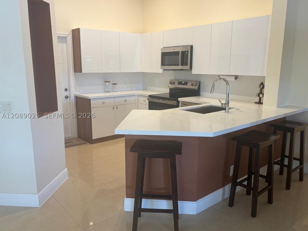 Photo of 1314 Canary Island Dr, Weston, FL 33327 (MLS # A12089025)