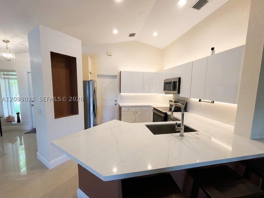 Photo of 1314 Canary Island Dr, Weston, FL 33327 (MLS # A12089025)