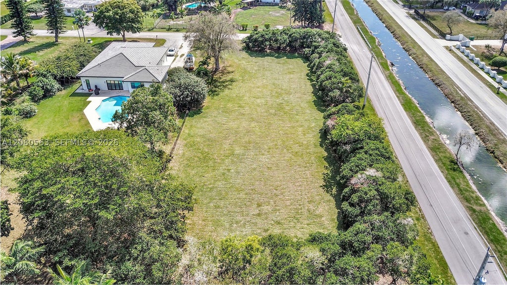 Photo of 28 SW Street, Davie, FL 33330 (MLS # A12080563)