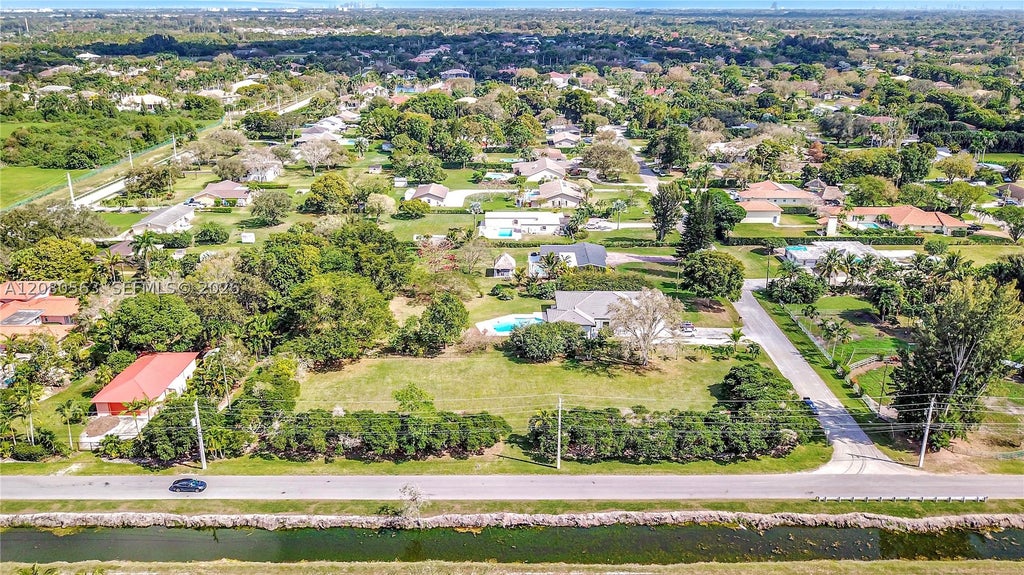Photo of 28 SW Street, Davie, FL 33330 (MLS # A12080563)