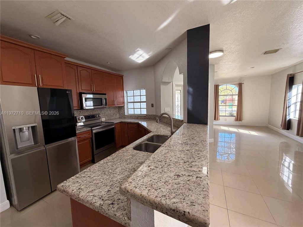 Photo of 2804 NW 7th Ct #2804, Fort Lauderdale, FL 33311 (MLS # A11972710)