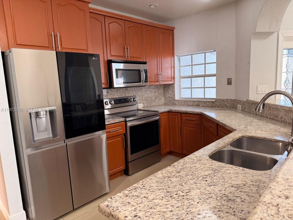 Photo of 2804 NW 7th Ct #2804, Fort Lauderdale, FL 33311 (MLS # A11972710)