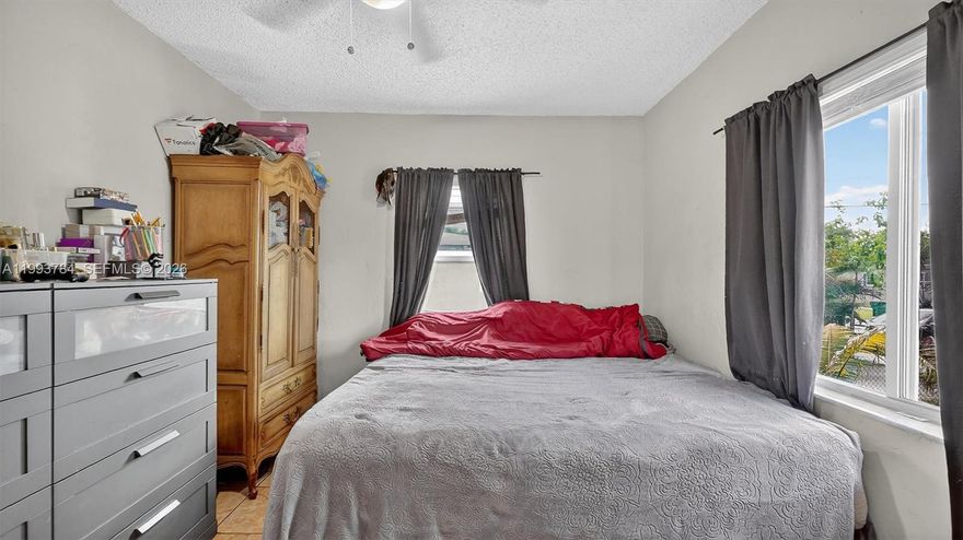 This is a unique gem.  It is a 2/1 on a good sized lot. This is the opportunity to get into a home at an affordable price. The roof was done in 2021, the A/C unit in 2023.  It has all impact windows.  It has a very convenient concrete storage with electrical done with permits. This is a great opportunity.