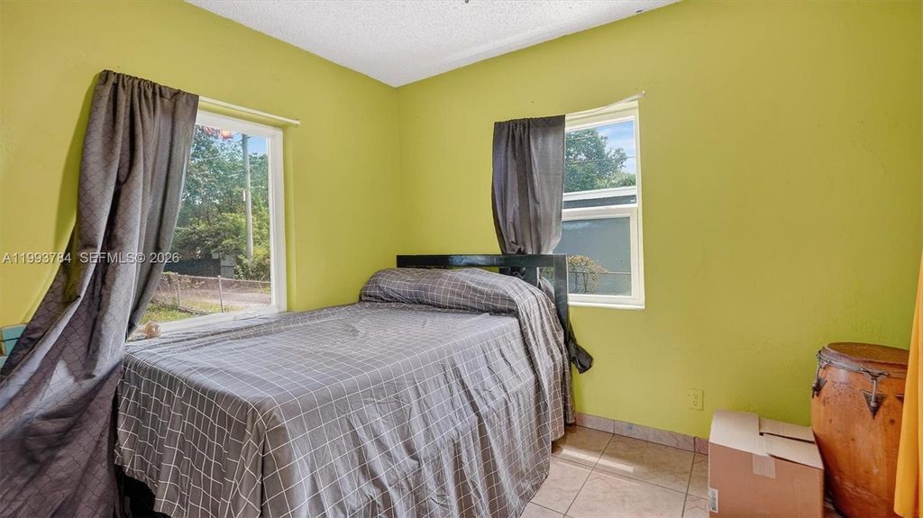 Photo of 12455 NW 16th Ave, North Miami, FL 33167 (MLS # A11993784)