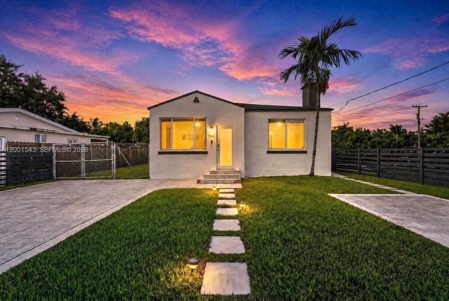 Discover the perfect blend of space, flexibility, and location in this well-maintained 5-bedroom, 2.5-bath Miami residence. Featuring impact windows, a freshly painted exterior, and an open-concept design, the home is currently configured as two living spaces for added versatility. The front offers 3 bedrooms and 1.5 bathrooms, while the rear includes a private 2-bedroom, 1-bath layout currently rented month-to-month—ideal for supplemental income, multigenerational living, or use the full single-family layout. The spacious yard provides ample room for boat or RV parking. Ideally situated just minutes from Wynwood, Brickell, Miami Beach, and within walking distance to Miami River Landing, this property presents a rare opportunity in a prime Miami location.
