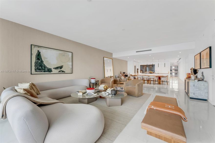 Discover luxury living, brand-new residence at the esteemed Aston Martin Residences Miami. This impressive 4-beds plus den features 5.5 baths exudes elegance and sophistication. Inspired by the iconic automotive brand, the design is modern and stylish, offering stunning views of Biscayne Bay and Miami Beach through expansive floor-to-ceiling windows and a balcony. Access to the Sky Amenities level, spanning 42,500 sq/ft of amenities, infinity pool, spa, private movie theater, state-of-the-art fitness center, virtual golf, art gallery, and dedicated kids’ and teens’ rooms. private elevator for added exclusivity. Inside, the home showcases superior craftsmanship with a gourmet kitchen featuring Gaggenau appliances, marble flooring, and abundant natural light streaming through large windows.