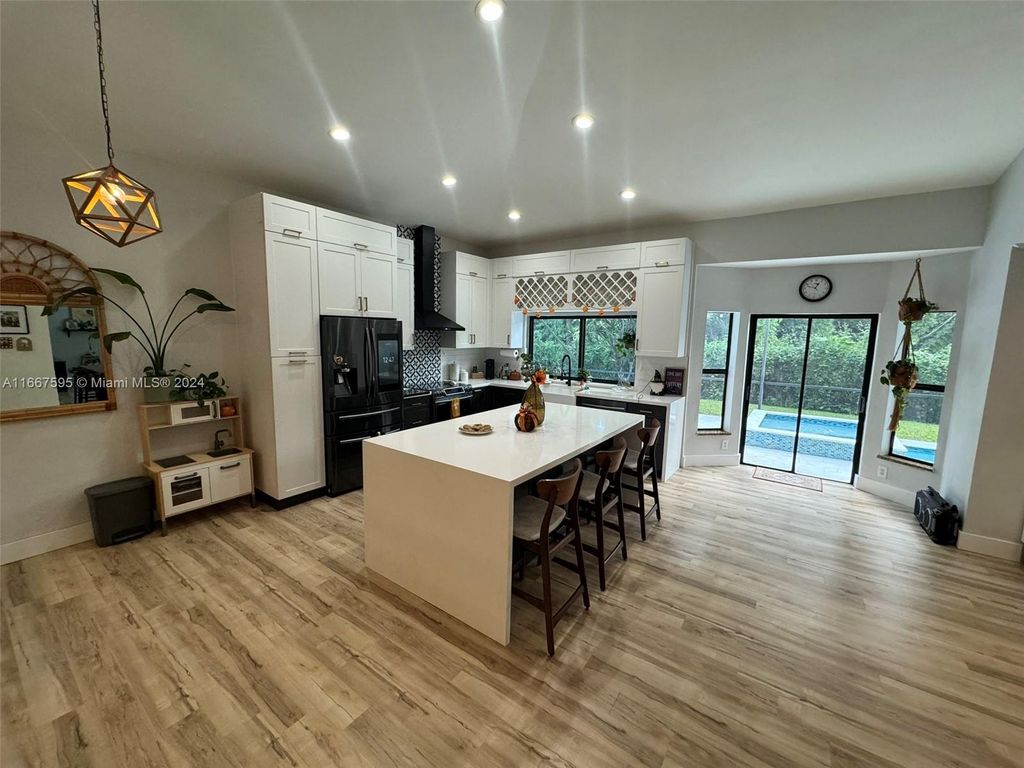 Photo of 6344 NW 50th St, Coral Springs, FL 33067 (MLS # A11667595)