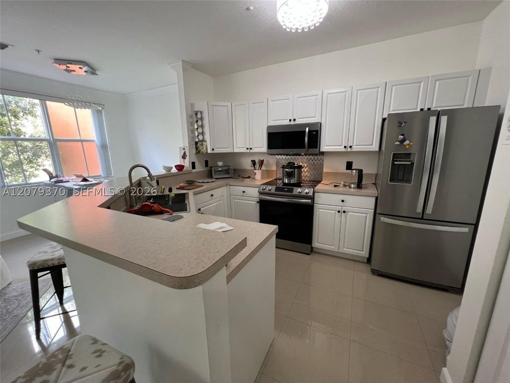 Photo of 4400 SW 160th Ave #1025, Miramar, FL 33027 (MLS # A12079370)
