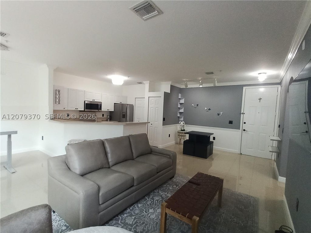 Photo of 4400 SW 160th Ave #1025, Miramar, FL 33027 (MLS # A12079370)