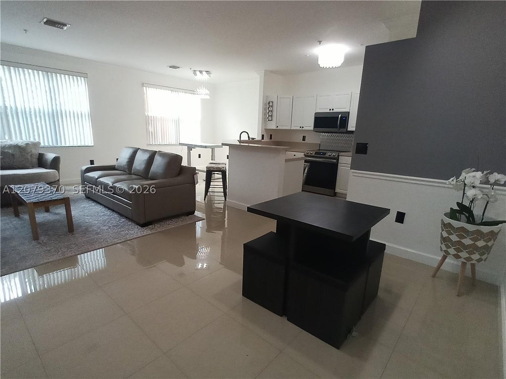 Photo of 4400 SW 160th Ave #1025, Miramar, FL 33027 (MLS # A12079370)