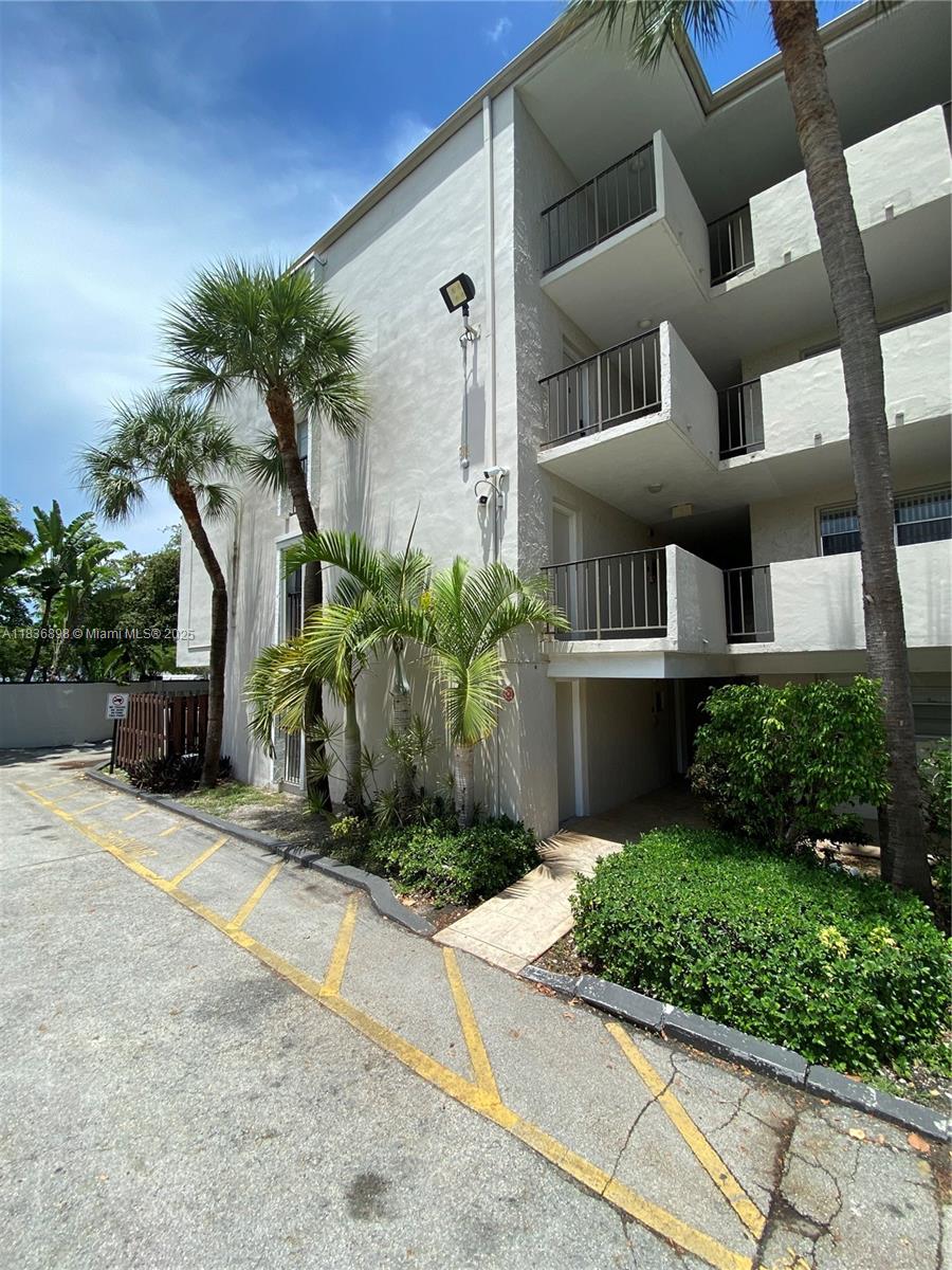 Amazing corner unit in the desired Pinecrest area!..Featuring a super bright & spacious 1/1 on the first floor . Wood cabinetry with granite countertops & eating counter/bar. Relax in the all fenced patio surrounded by magestic trees. conveniently located steps from all amenities, elevators, Laundry room and parking lot. The Dadeland Grove community is all gated for security & privacy PLUS Management on site. walking distance to worldwide famous DADELAND MALL, Dadeland Downtown & Metro Rail Estation. this one is a TRULLY..LOCATION LOCATION unit!