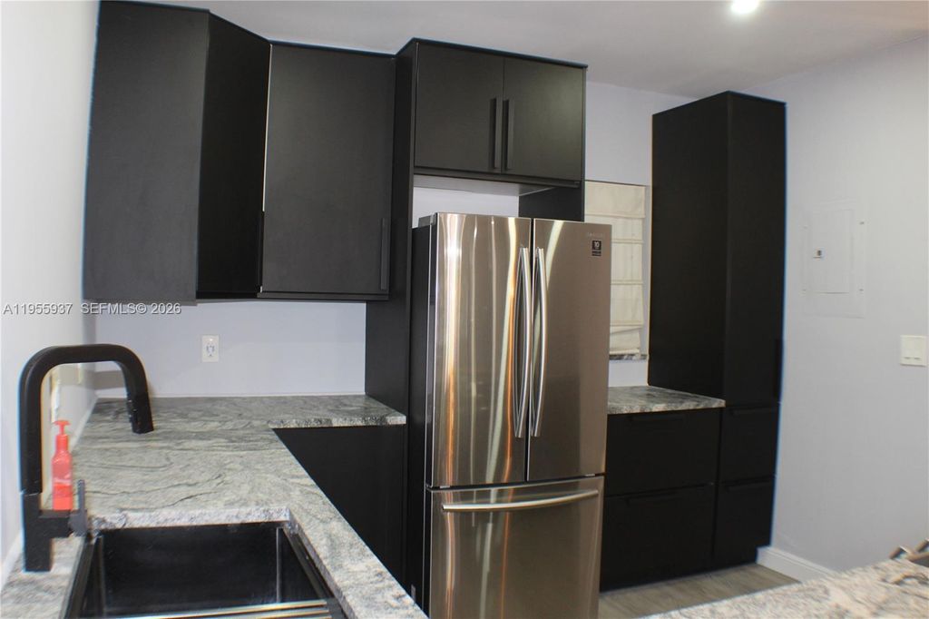 Photo of 6731 Cypress Rd #205, Plantation, FL 33317 (MLS # A11955937)