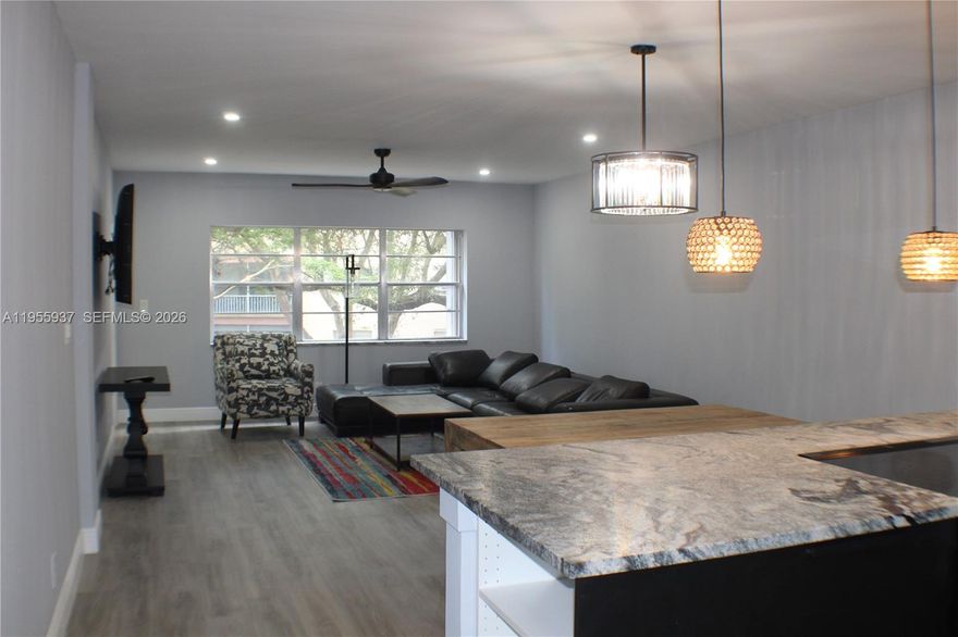 Beautifully remodeled 1BR/1.5BA second-floor condo in a desirable 55+ community in the heart of Plantation. This move-in ready unit features a brand-new kitchen with modern cabinetry, granite countertops, and new Samsung stainless steel appliances. Enjoy new tile flooring throughout, smooth ceilings, LED recessed lighting, two contemporary ceiling fans, and fresh interior paint for a bright, modern feel. Comfort is covered with a new 2026 Rheem A/C system. Spacious primary bedroom with walk-in closet, ensuite bath. Updated, convenient half bath for guests. Relax on the screened balcony overlooking the peaceful courtyard — perfect for morning coffee or evening breezes. Well-maintained community offers active lifestyle amenities including a pool, billiard room, BBQ area, updated elevators, newer roof, and freshly painted buildings. Excellent location close to shopping, dining, medical facilities, and major roadways. Easy Florida living at an affordable price — don’t miss this one!