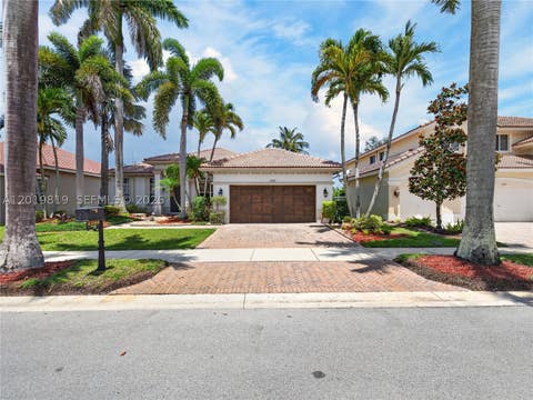 Photo of 2288 Quail Roost Dr, Weston, FL 33327 (MLS # A12019819)