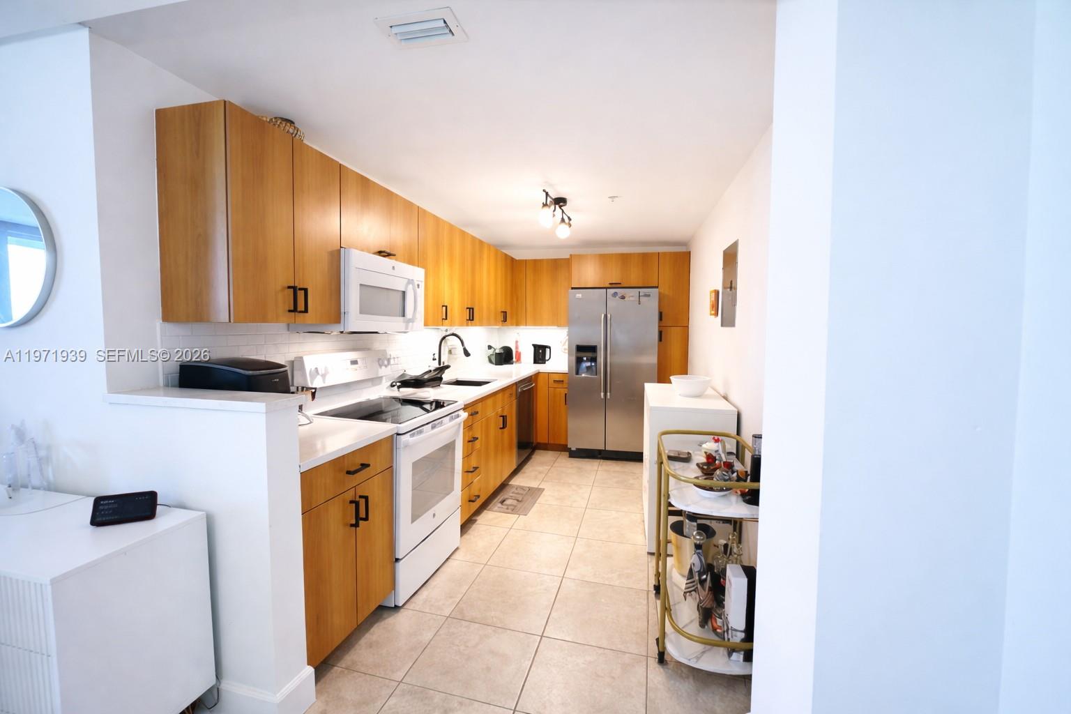 TREASURES ON THE BAY II C - Residential