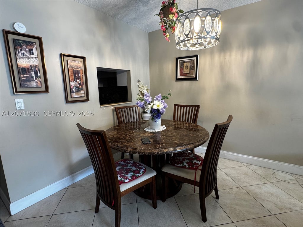 Photo of 1000 Hillcrest Ct #214, Hollywood, FL 33021 (MLS # A12071830)