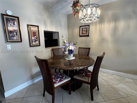 Photo of 1000 Hillcrest Ct #214, Hollywood, FL 33021 (MLS # A12071830)