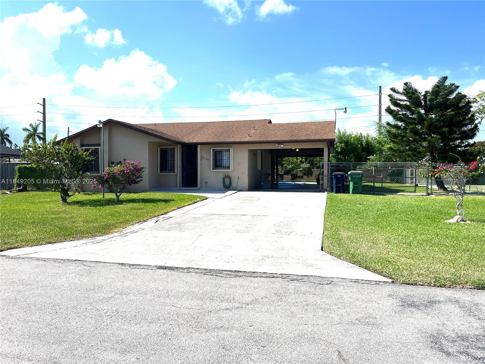Fall in love with this charming 3-bed, 2-bath single-family home on a private corner lot! Located in a quiet, centrally located neighborhood just minutes from top-rated schools, parks, major highways, shopping malls, and dining options. This move-in-ready home offers added privacy with no neighbors on one side and features a bright, open layout filled with natural light. Enjoy a covered front porch, a versatile storage room, and a spacious backyard—perfect for entertaining, relaxing, or building your dream pool. There's plenty of room to park your boat or RV. Accordion shutters throughout provide convenience and protection. Whether you're a first-time buyer, downsizing, or upgrading, this home is the perfect fit. Easy to show and ready for its next owner—schedule your private tour.