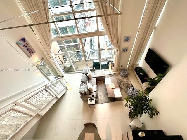 Discover the ultimate Downtown Miami lifestyle. This tastefully furnished two-story loft with soaring 20 ft. ceilings offers a unique blend of elegance and convenience. Enjoy resort style amenities including 4 pools, two-story state of the art fitness center, spa, jacuzzi, business center, valet, 24/7 concierge desk, and more. The unit features ceramic tiles throughout, gourmet kitchen, walking closet, one parking space in the same floor. Perfectly located within walking distance to Bayside Marketplace, Kaseya Center, Whole Foods, restaurants, public transportation. This beautiful unit puts the best of Miami right at your doorstep.