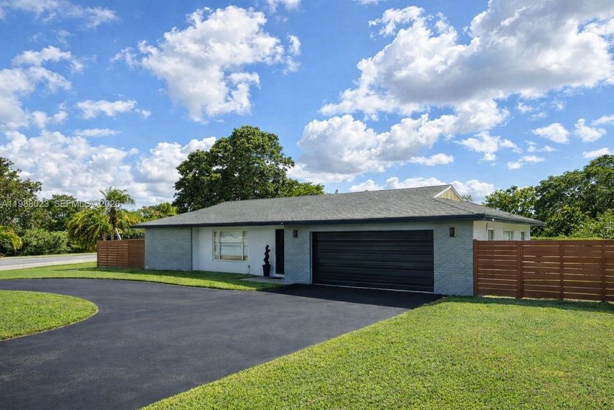 Welcome to this beautifully updated 3BD/2BA home in the sought-after Westwood community of Tamarac—where style, space, and lifestyle come together effortlessly. Flooded with natural light, the open-concept layout is anchored by a stunning chef-inspired kitchen with sleek, modern finishes. Designed for both comfort and flow, the home wraps around a spacious screened patio—creating seamless indoor-outdoor living. The primary suite, living room, family room, and second bedroom all offer direct access, making this the perfect setup for entertaining or everyday enjoyment. The split floor plan provides privacy, while spa-like updated bathrooms and beautiful flooring elevate every space. Step outside to a huge, fully fenced backyard with peaceful lake and golf course views—and ample room to design your dream pool and outdoor retreat. An expansive 2-car garage offers incredible storage, a flexible office space ideal for working from home and ample space for 2 cars. Located in Westwood, centrally positioned near shopping, dining, parks, and major highways. This one is truly special—you’ll want to see it in person.