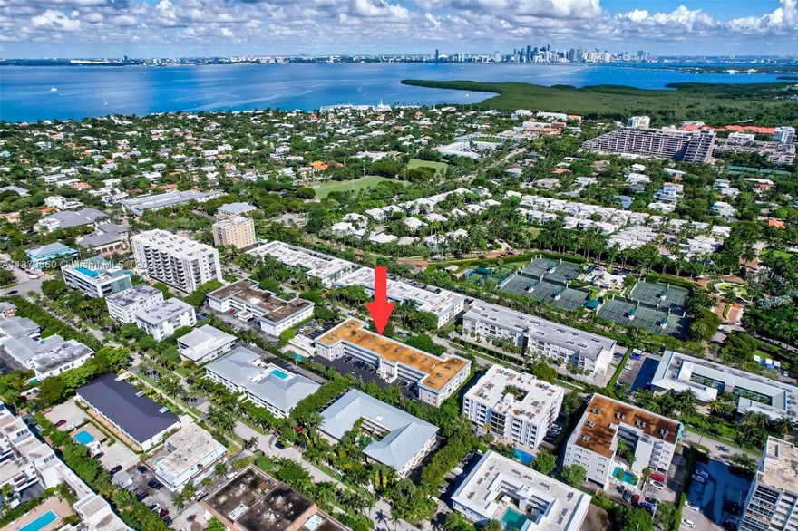Light and modern, this fully remodeled 2-bedroom, 2-bath residence is located in a boutique Key Biscayne building. Set on a picturesque tree-lined street, this apartment showcases a sleek open layout, designer kitchen with quartz countertops, premium stainless steel appliances, and contemporary tile flooring throughout, high impact windows. The enclosed balcony offers additional living space, perfect for relaxing or entertaining. Residents enjoy a private pool with just steps from the beach. Walk to all that Key Biscayne has to offer, shops, cafes, restaurants, schools, and a one of a kind community center.
