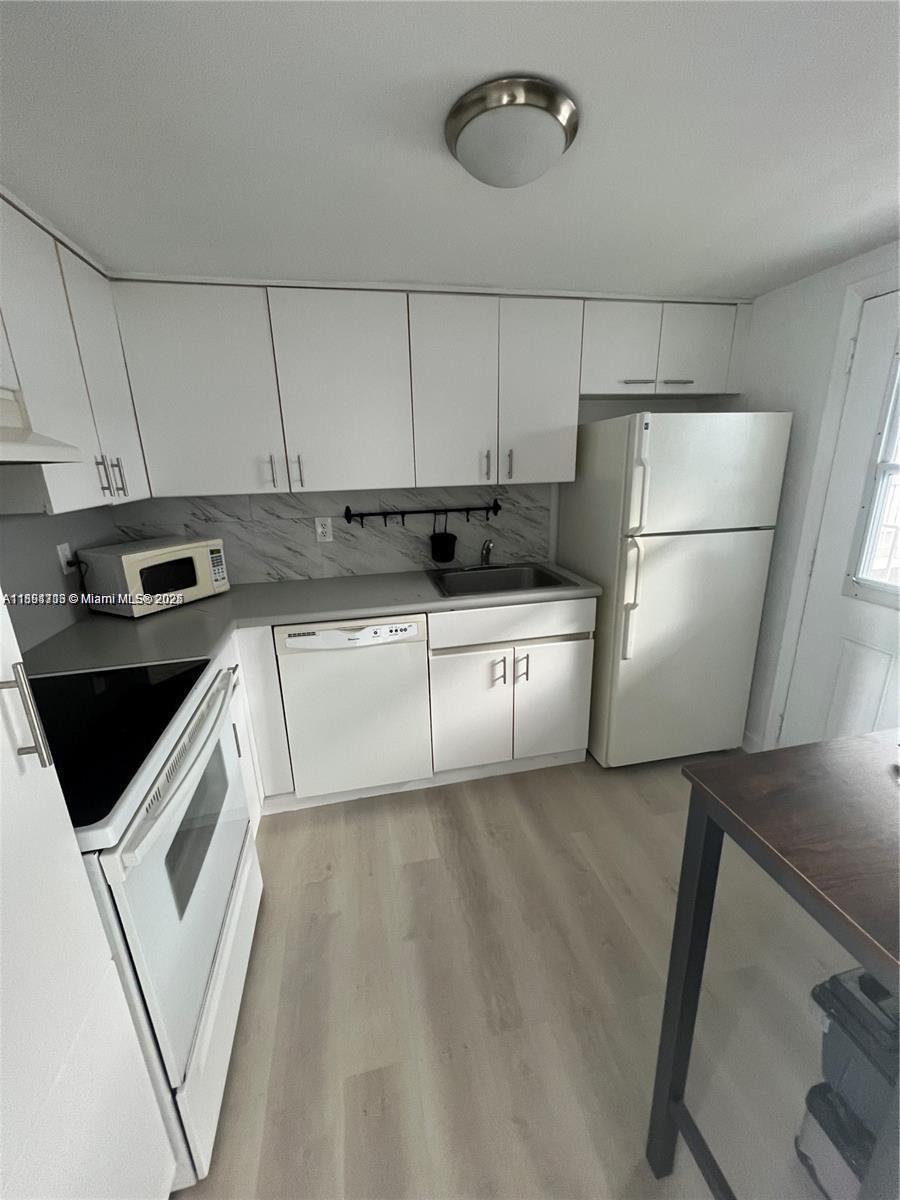 ISLE OF NORMANDY CONDO - Residential Lease