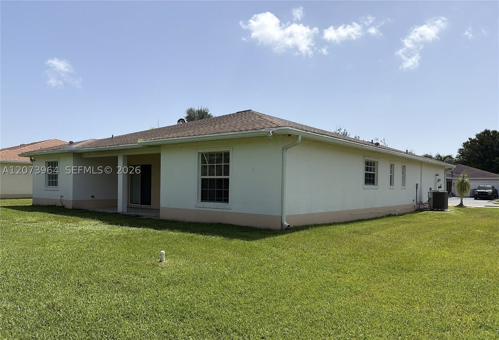 Photo of 6517 Las Palmas Way, Port St Lucie, FL 34952 (MLS # A12073964)