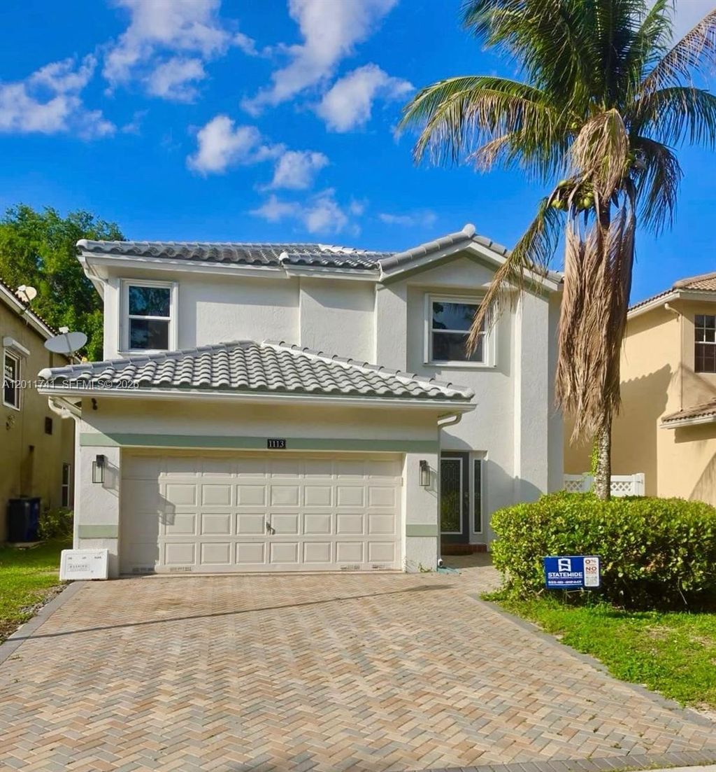 Photo of 1113 NW 97th Dr, Coral Springs, FL 33071 (MLS # A12011741)