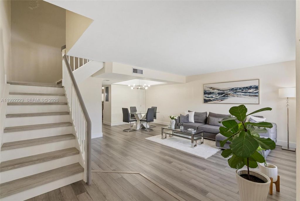 Photo of 1350 NW 123rd Ave, Pembroke Pines, FL 33026 (MLS # A11992229)