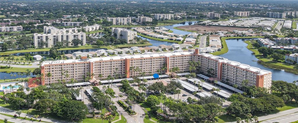 Photo of 7370 S Oriole Blvd #103, Delray Beach, FL 33446 (MLS # A11443715)