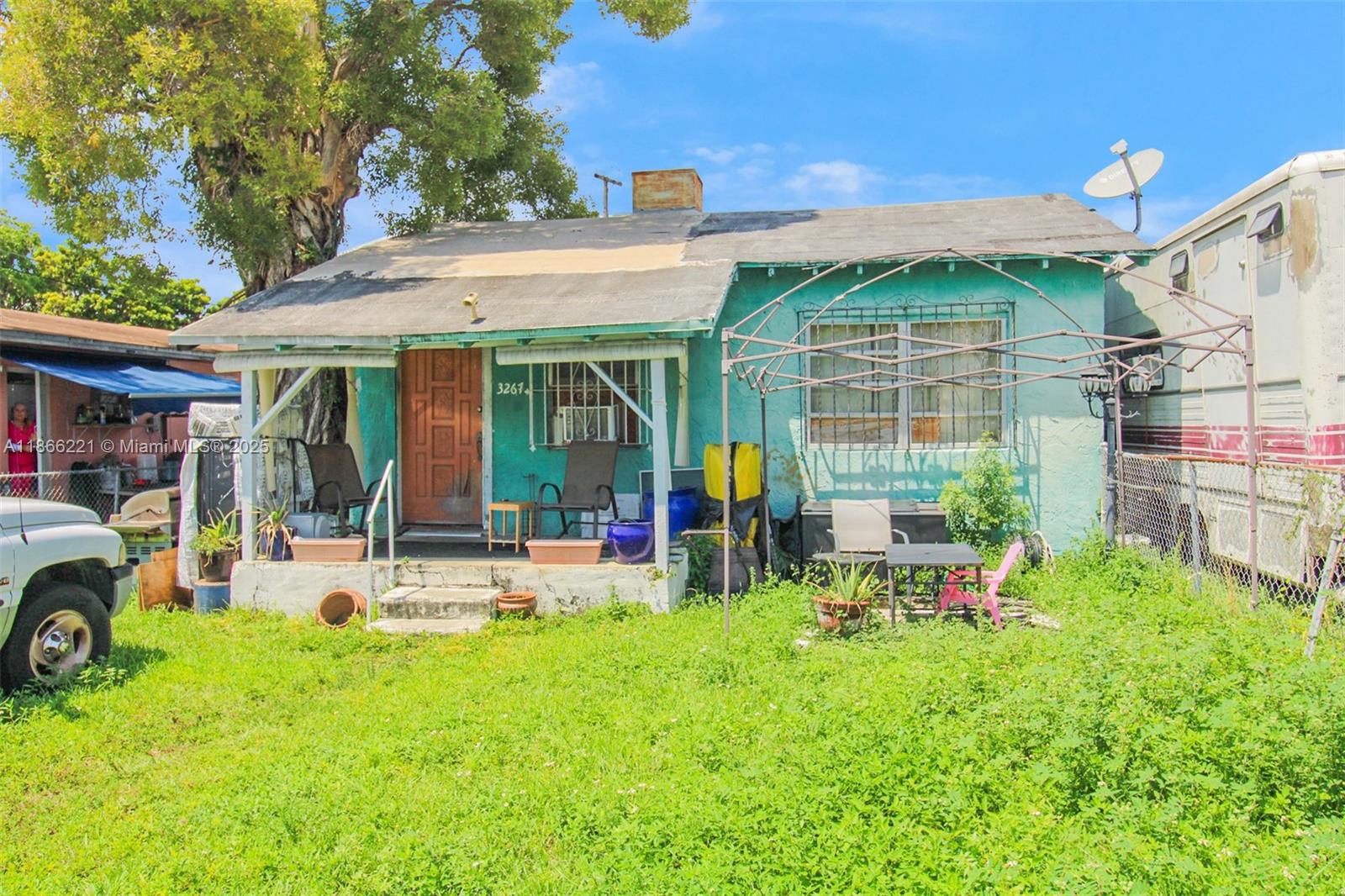 Tear down Single-Family Home in Miami-Dade County on Zoned RU-3 lot allowing 2 to 4 units to be built subject to lot size, parking and set back requirements. Please check with an architect to verify. Sold AS-IS. Rented currently. Most of the back yard is paved behind on the north side and used as additional parking for the two office buildings adjacent and to the north at 3270 & 3288 NW 36th Street. This could be purchased as part of a land assemblage and development of up to 46 units. Assemblage potential for development see MLS #A11865931