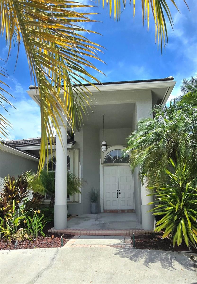 Stunning 5-bedroom, 3-bathroom single-story home with a desirable split floor plan, located in the prestigious gated community of The Islands in Weston. Situated on an oversized private lot, this home features a spacious patio with a large pool, perfect for entertaining. Highlights include new flooring, updated bathrooms, a beautifully upgraded kitchen with almost all new appliances and a bright, expansive family room with stylish stone and wood accent walls. Ideally located within walking distance to Weston Town Center and Tequesta Middle School, and zoned for top-rated A+ schools. Must see!!