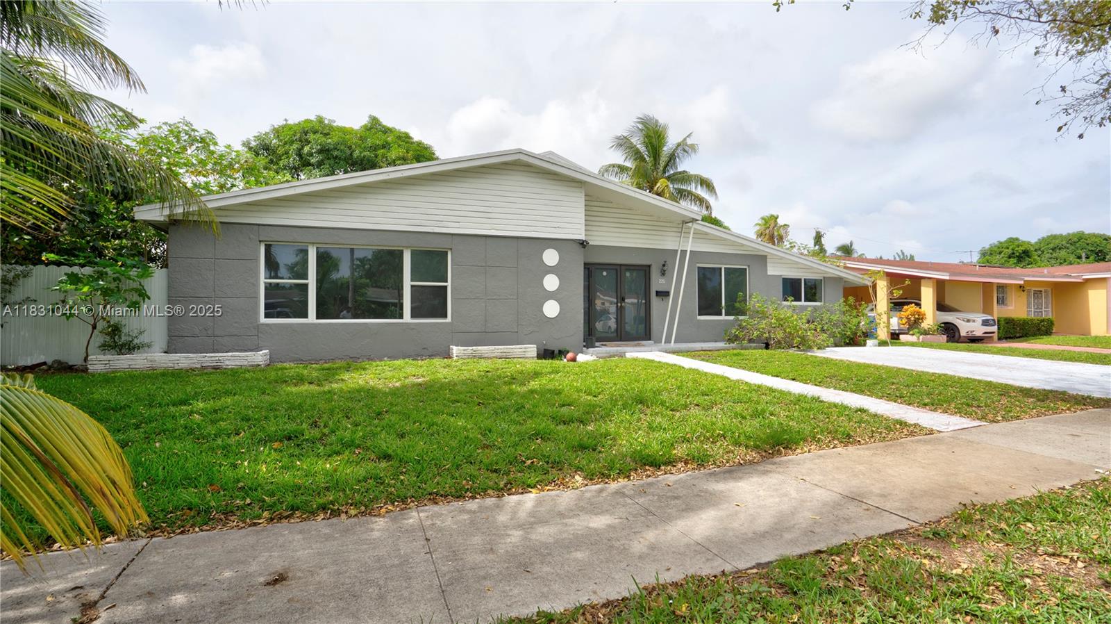 in North Miami Beach! This stunning 4-bedroom, 3-bathroom single-family home offers 2,950sq ft of beautifully renovated living space on an oversized 10,500+ sq ft lot. Recently updated with a brand roof A/C, and water heater, this home blends mid-century charm with modern functionality. The split-bedroom floor plan provides privacy and flexibility, ideal for families or remote professionals. The primary suite features a walk-in closet and spa-like bath, while the additional bedrooms are bright and generously sized. One bathroom is completely remodeled with high-end finishes; the others are well-maintained and stylish. No HOA. No nonsense. Just pure Miami living.