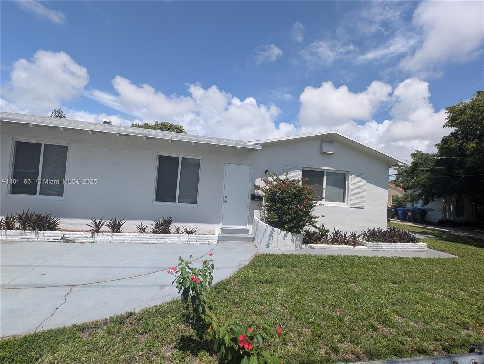 Nested in the heart of Hollywood this charming 2/1 (part of a duplex) is just few minutes to the shops and restaurants and just 8 minutes to the beach. House has hurricane proof windows, 2 entrances, open kitchen -living room, central AC, stainless steel appliances, laminate flooring, modernized bathroom, large closets. Plenty of parking and enclosed concrete patio, great for outside enjoyment and for pets. Laundry room shared with just 1 other. Partially furnished but can be delivered vacant too. Fast and easy approval process. Come and take a look today!