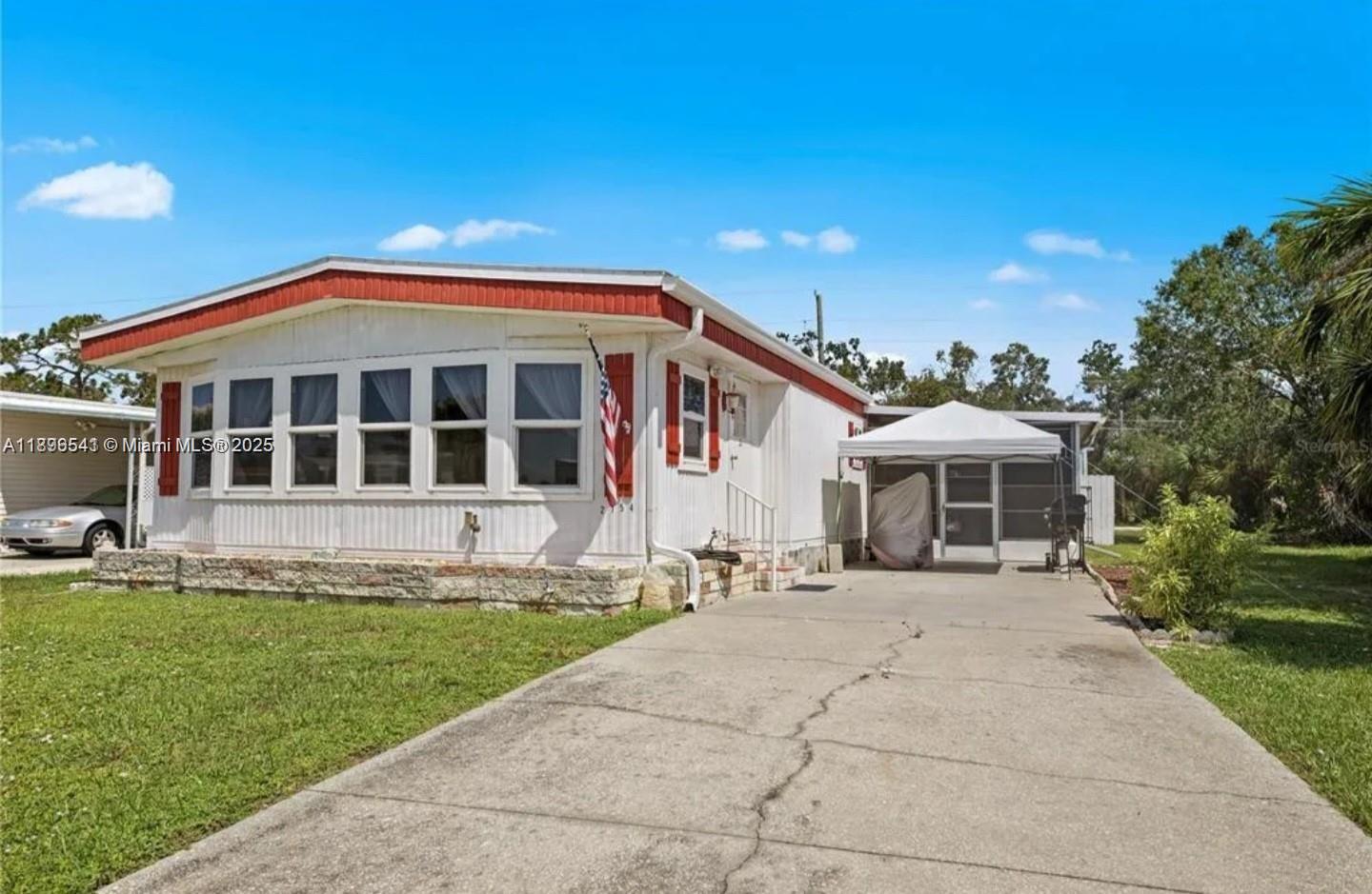 Enjoy the laidback living of Englewoods 55 and older community. This home features 2 bedroom, 2 bathrooms, an added sunroom and 2 sheds in the backyard. Located just minutes away from the West Coast beaches. The HOA fees are only $3 a month. This community is very well kept and offers a community pool, shuffleboard, pickleball and more activities. Easy to show. NO FLOOD INSURANCE NECESSARY.