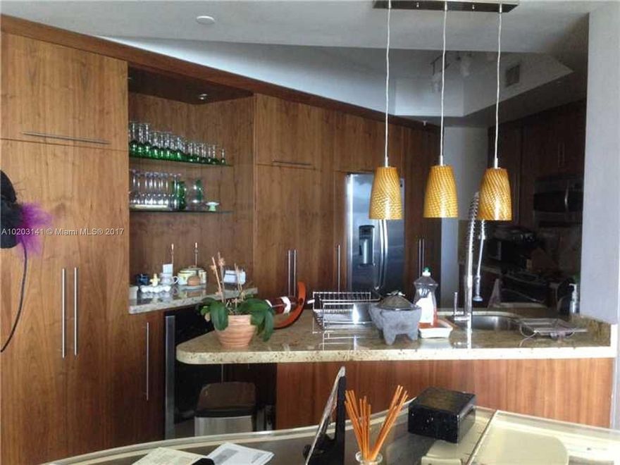 GORGEOUS UNIT. UNOBSTRUCTED VIEW OF THE BAY 3 BALCONIES, MARBLE FLOORS, ONE OF THE BEST LINES IN PRESTIGIOUS TEQUESTA POINT. SPLIT FLOOR PLAN. 1310 SQFT PLUS TERRACE.