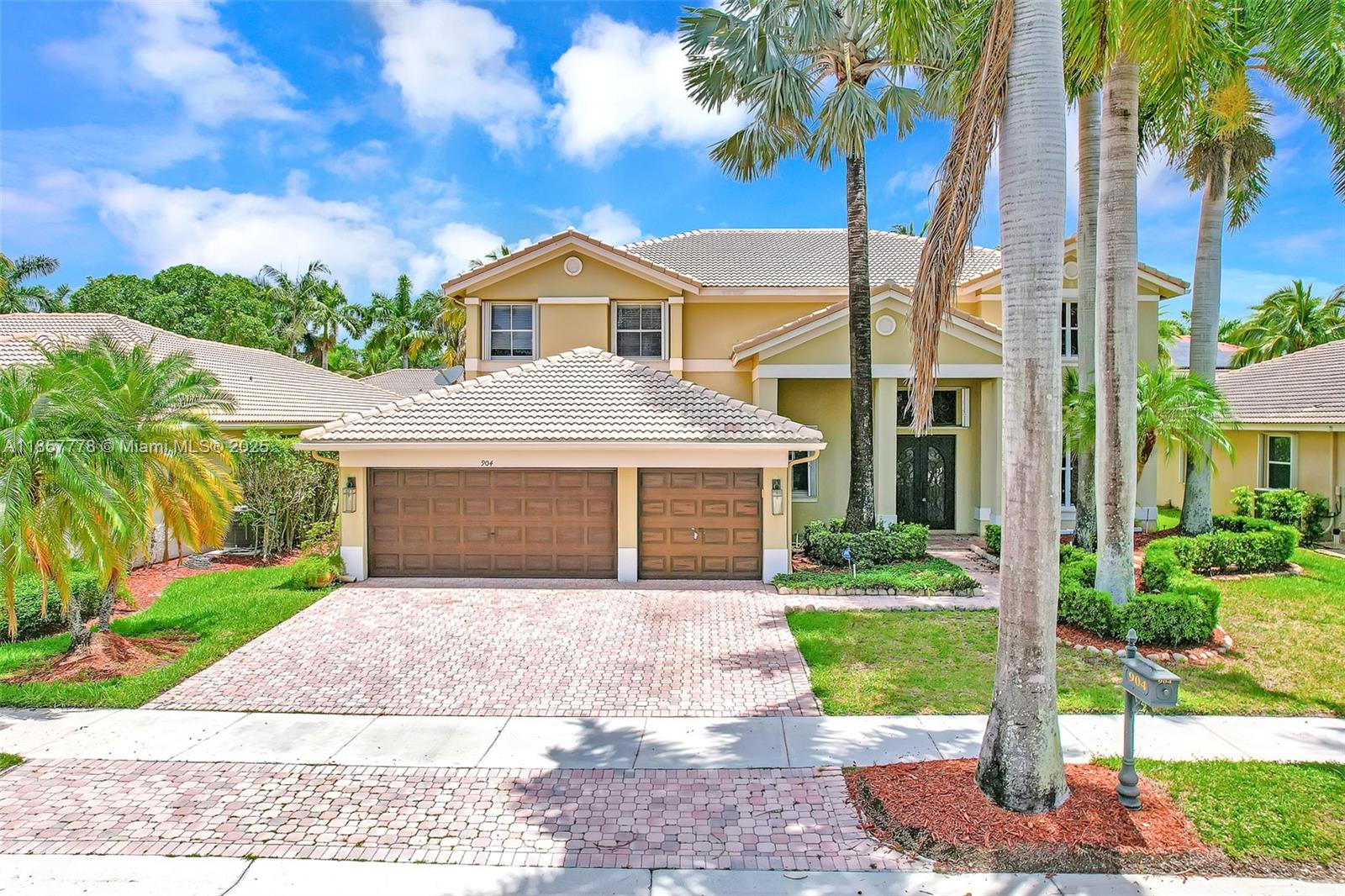 Stunning 2 story home with 6 spacious bedrooms, 5 full baths and tons of closet space in one of Weston's most prestigious gated communities. This home offers an ideal blend of luxury & comfort. The main level showcases a convenient entry level master bedroom & 2 baths ideal for guests, 3 car garage with a gym, while upstairs reveals 2 master suites-one with a California-style walk-in closet & a connect flex room perfect for an office or nursery. French doors that open up to your own tropical retreat with an irresistible outdoor oasis complete with pool, fire pit, tiki hut, built-in grill, & multiple lounging areas making this a haven for entertaining & relaxation. Enjoy the peace of a secure gated community & top tier amenities. Includes access to Country Club membership for golf & tennis.