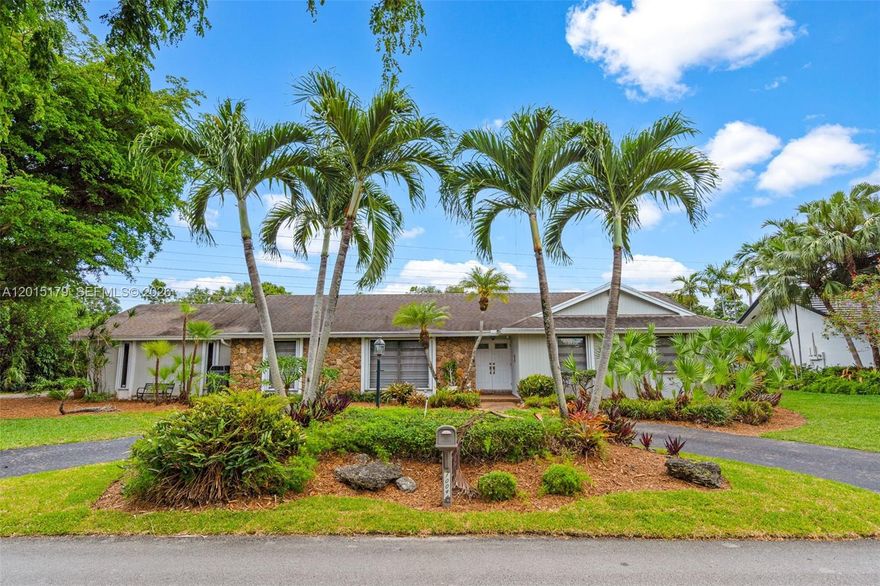 Nestled in the desirable Woods of Pine Estates neighborhood, this gorgeous 4-bedroom, 2-bathroom residence offers the perfect blend of comfort, charm, and space. Situated on an expansive 25,311 SF lot, this well-built Stoker home features 2,383 SF of living area thoughtfully designed for both everyday living and entertaining. Inside, you’ll find spacious and inviting living areas including a formal living room, dining room, and a warm family room with a cozy fireplace and serene backyard views. The kitchen and main living spaces create a seamless indoor-outdoor flow, ideal for entertaining or simply enjoying the peaceful surroundings. The oversized primary suite serves as a private retreat, complete with French doors opening to the lush backyard oasis. Outside, the beautifully landscaped backyard offers privacy, tranquility, and endless possibilities for outdoor living. Additional highlights include a spacious laundry room, a 2-car garage with ample storage space, and a charming tree-lined driveway leading to the side-entry garage with peaceful backyard views. The property’s unique setting further enhances its appeal and creates a warm, welcoming atmosphere. The home also includes recently upgraded shutters, a full exterior camera system, and an alarm system for added peace of mind. A rare opportunity to own a cozy and truly special home in one of the area’s most sought-after neighborhoods.