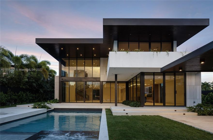 Your brand new construction tropical modern home awaits you in Golden Beach. Curated by the esteemed TREO Construction and SDH Studio Architecture+Design, this near 7,000 sqft home upon a 13,125 sqft lot offers a phenomenal fluid flow of design with soaring ceiling heights, 6 generous sized bedrooms, plus an office, gym and service quarter. Stunning top of the line Italian kitchen that is a showpiece of this home. Upon 75 ft of private water-frontage with exquisite views, the home comes fully equipped for boating and water toys, this is the oasis you have been dreaming of. Located on a privileged location with a short walk to the private beach, as well as the nine private parks, all under the supervision of the private police department, experience the magical world of Golden Beach.