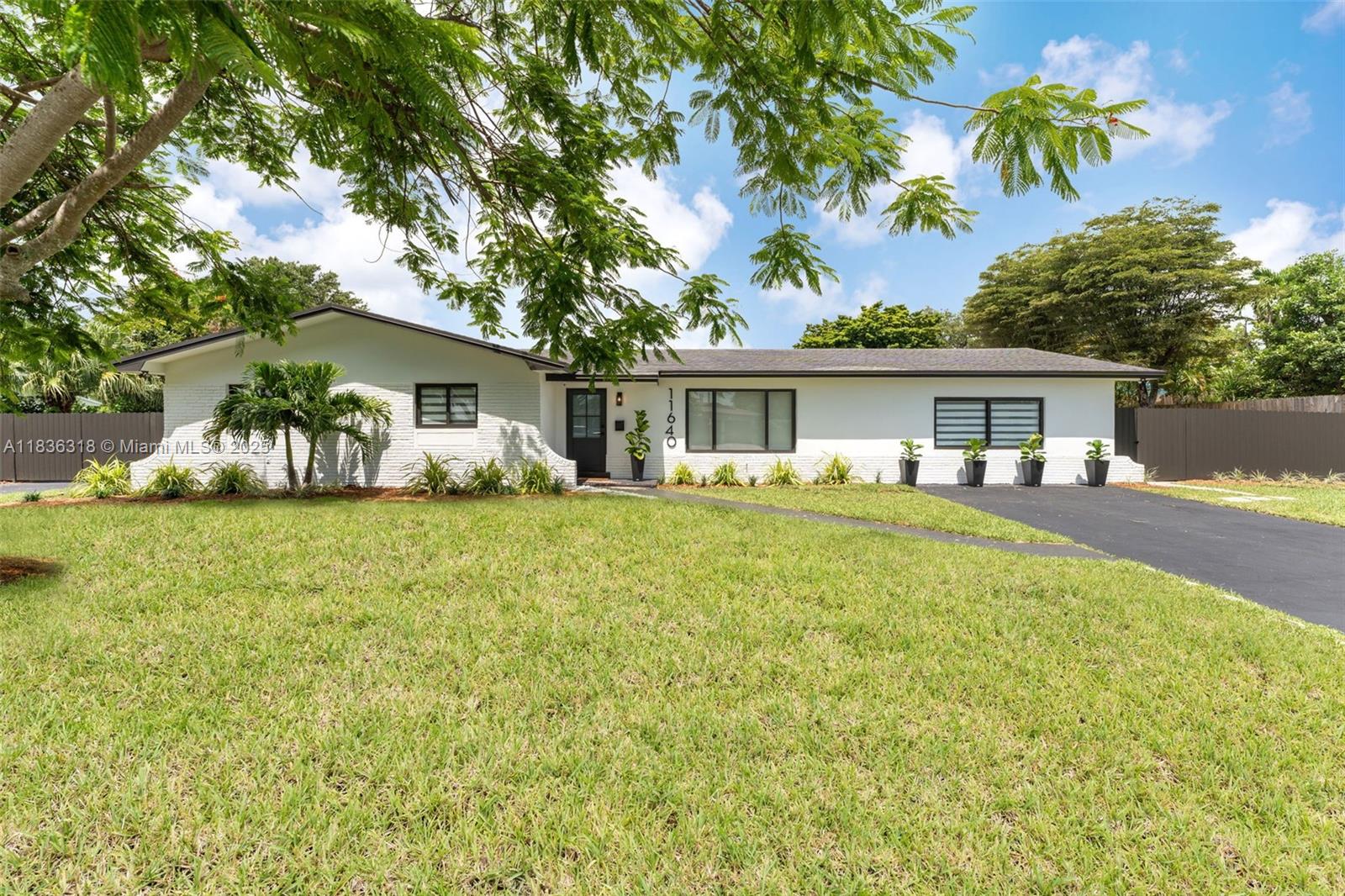 Welcome to this updated 5BD/3BA pool home in Pine Acres on a 17,424 SF lot. With 2,403 SF of living space, the main home offers 4BD/2BA plus a private 1BD/1BA in-law suite w/ kitchenette—perfect for guests or extended family. Enjoy the remodeled kitchen w/ quartz countertops & new stainless steel appliances, updated gorgeous bathrooms, new impact windows/doors, updated PVC plumbing, and fresh paint inside & out. The outside oasis features a large concrete patio surrounding the sparkling pool—ideal for entertaining, lounging, or weekend barbecues. The oversized lot offers endless possibilities for outdoor fun and relaxation. Located in a golf cart-friendly neighborhood known for its great schools, holiday parades and community charm. A true gem in this sought-after location won't last!