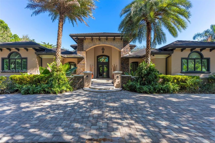 Rare opportunity custom built home on builders acre in highly desired Nutmeg Estates/Baptist Hosp location w/ high-end features includ’g: marble floors, solid wd doors & casing, floorboards, built in cabinetry & beautiful wd beams thru-out as well as 4 bedrooms + office/den, 4.5 bathrms incl pool bath, 19-20’ high Great Rm w/ two-way fireplace, spacious dining room, 3 car garage, huge kitchen w/ island, eat in area, high ceilings thru-out.  The backyard is an oasis complete w/ outdoor kitchen, covered patio, beautiful lagoon waterfall pool w/ spa ideal for entertaining/relaxing with family & friends. This stunning home is situated in a prime location w/ access to top rated schools, Dadeland Mall & more, on a beautifully landscaped 39,073sf lot surrounded by beautiful mature live oaks.