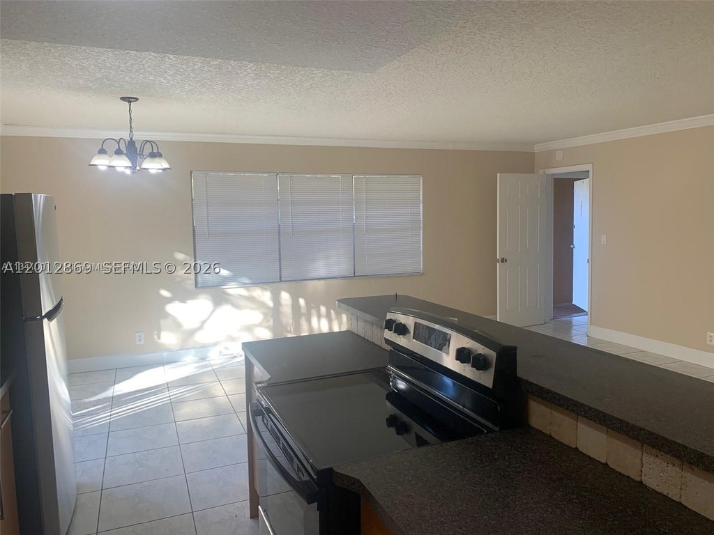 Photo of 1702 Mckinley St #4, Hollywood, FL 33020 (MLS # A12012869)