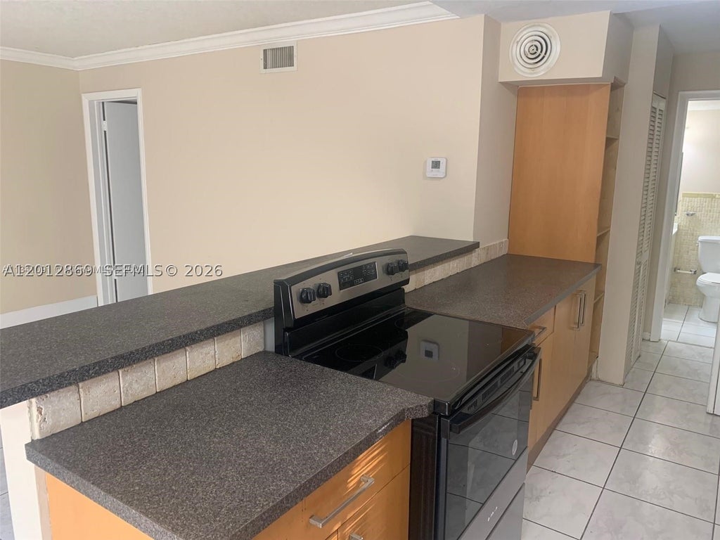 Photo of 1702 Mckinley St #4, Hollywood, FL 33020 (MLS # A12012869)