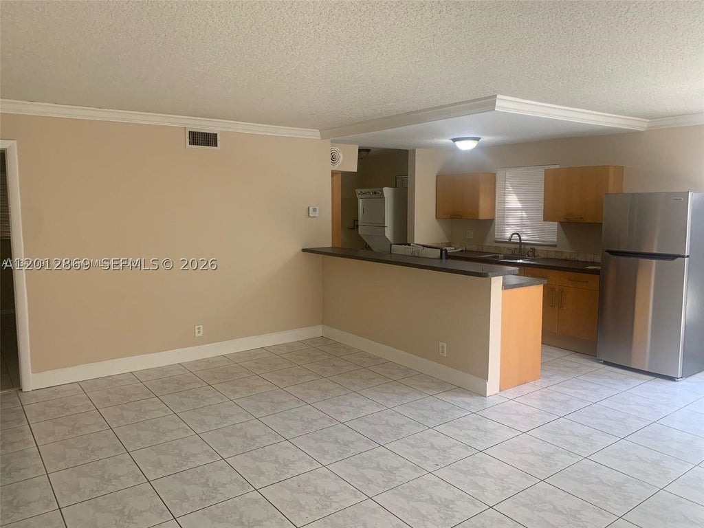 Photo of 1702 Mckinley St #4, Hollywood, FL 33020 (MLS # A12012869)